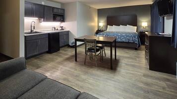 Suite, 1 King Bed, Non Smoking (Efficiency, Upgrade) | Laptop workspace, iron/ironing board, travel crib, free WiFi