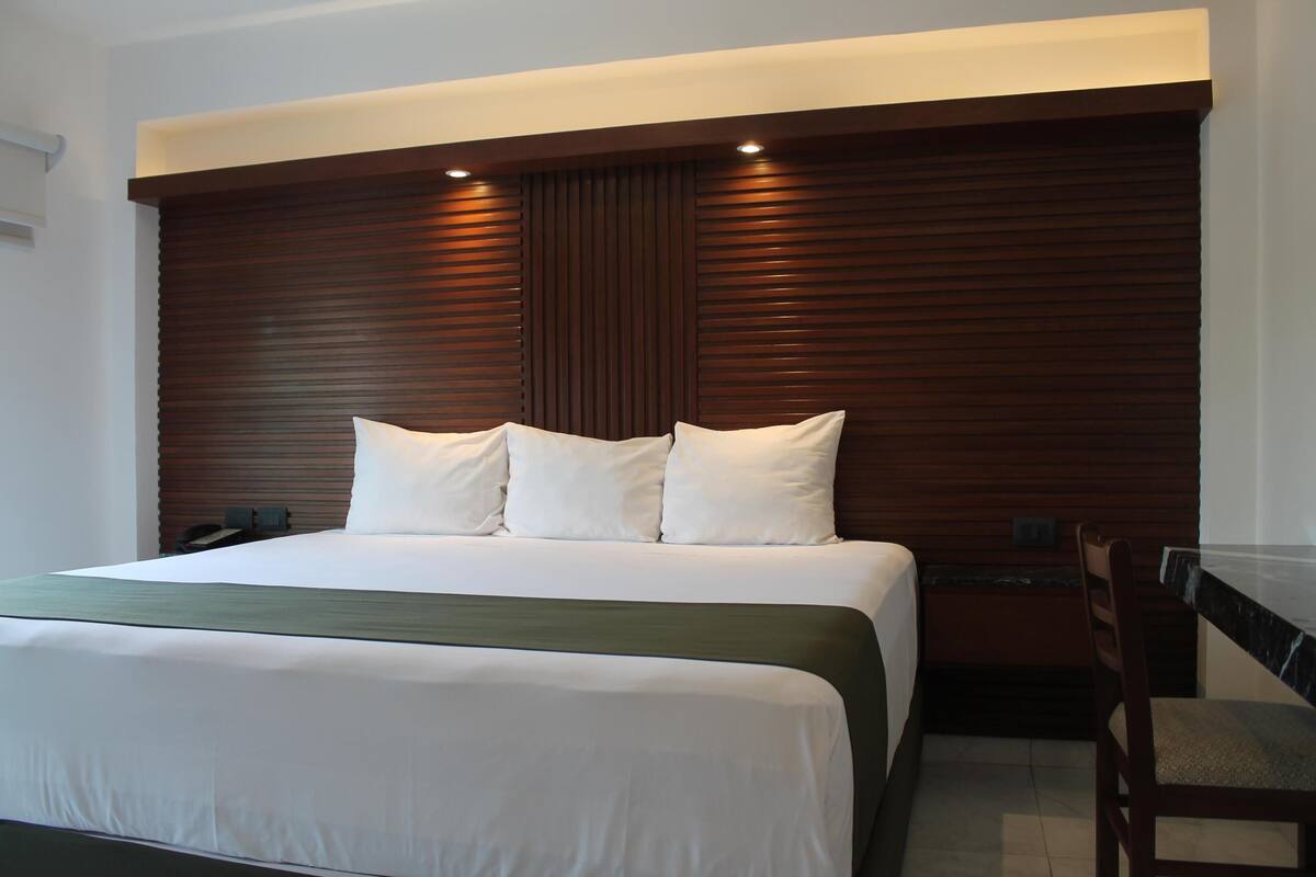 Premium bedding, in-room safe, desk, soundproofing