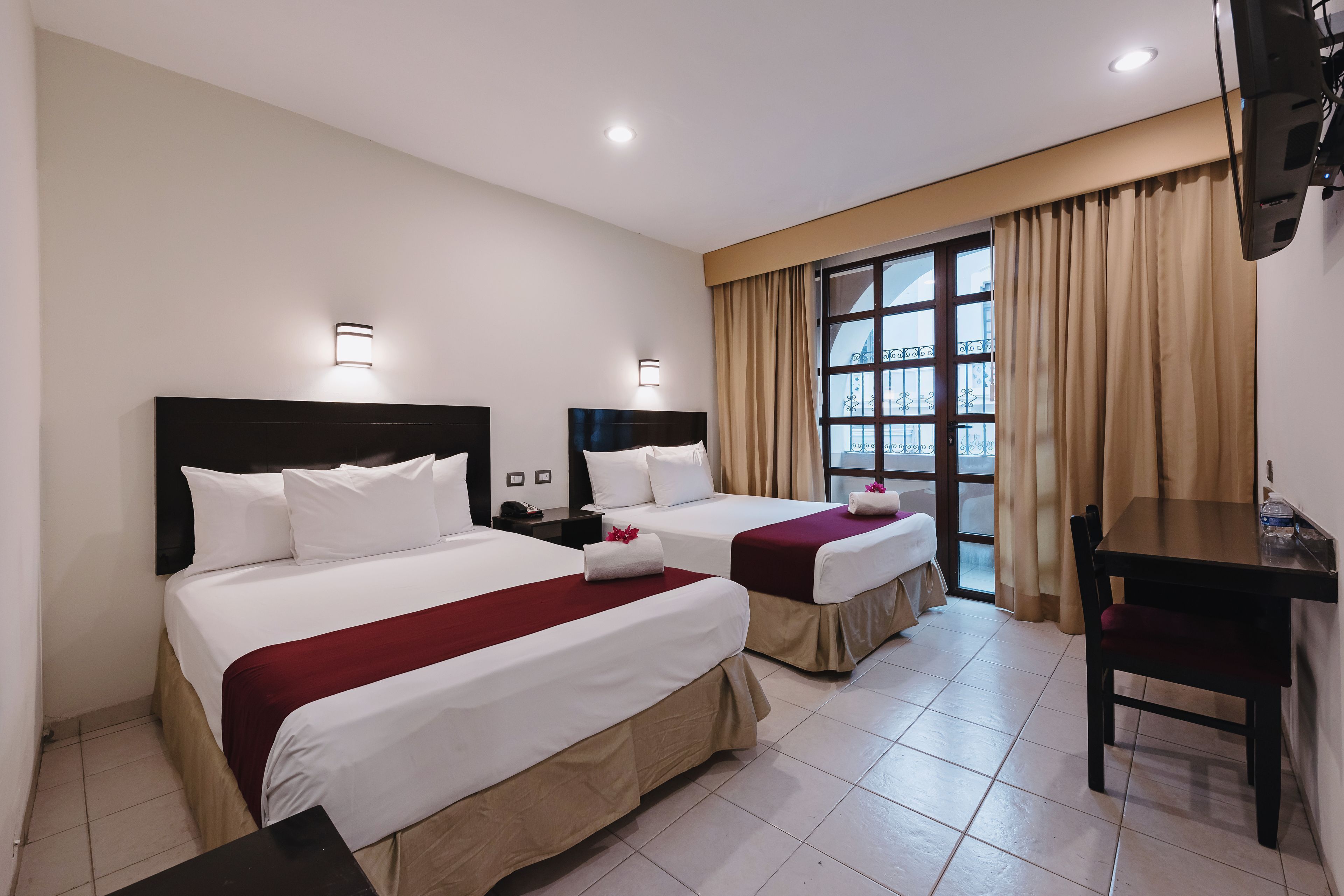 Premium bedding, in-room safe, individually decorated, desk