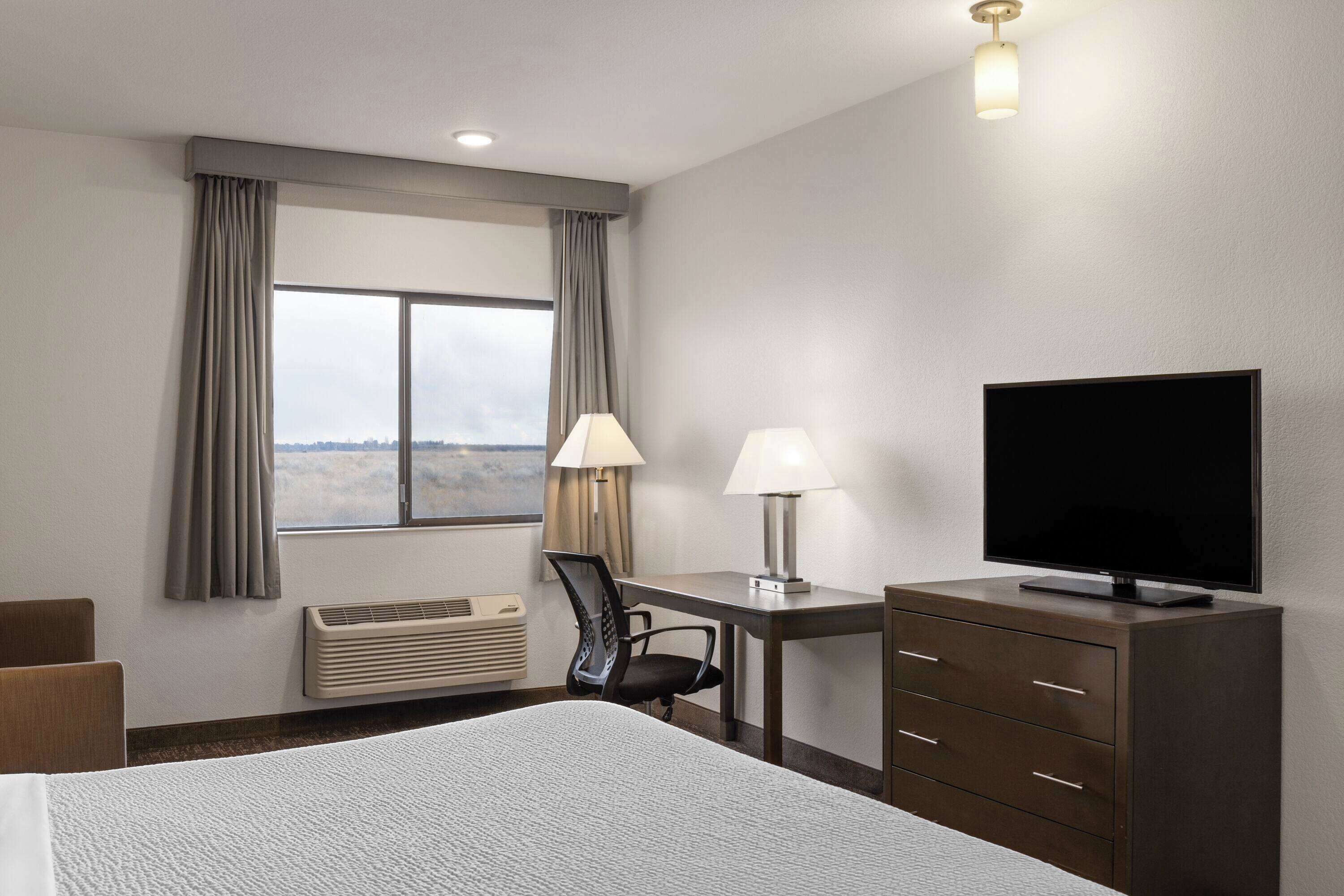 studio suite, 1 king bed, non smoking | pillow-top beds, individually furnished, desk, laptop workspace