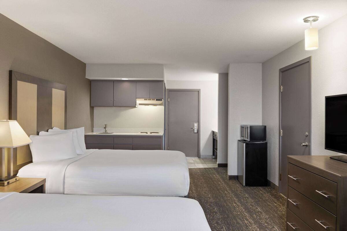 deluxe studio suite, 2 queen beds, non smoking | pillow-top beds, individually furnished, desk, laptop workspace