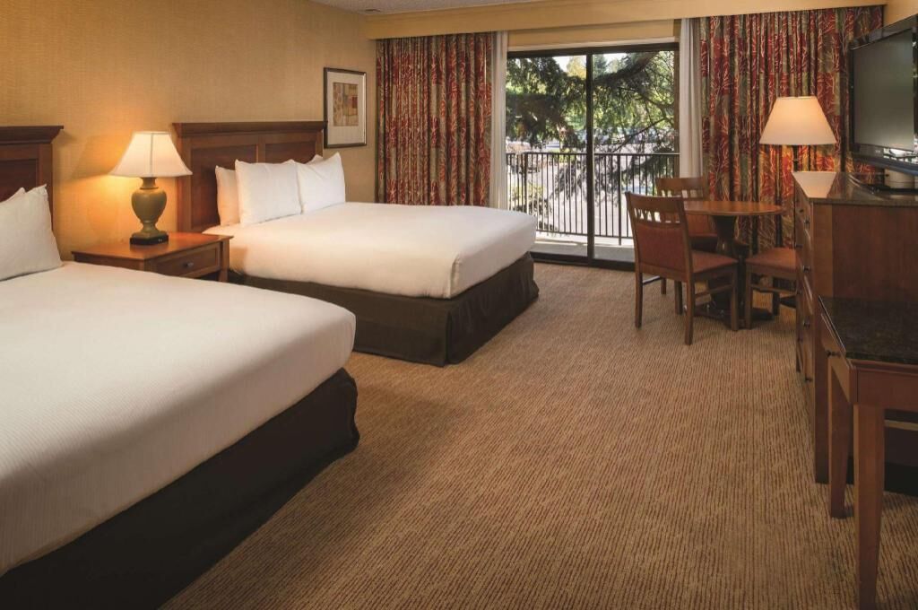 Premium bedding, down comforters, pillowtop beds, in-room safe