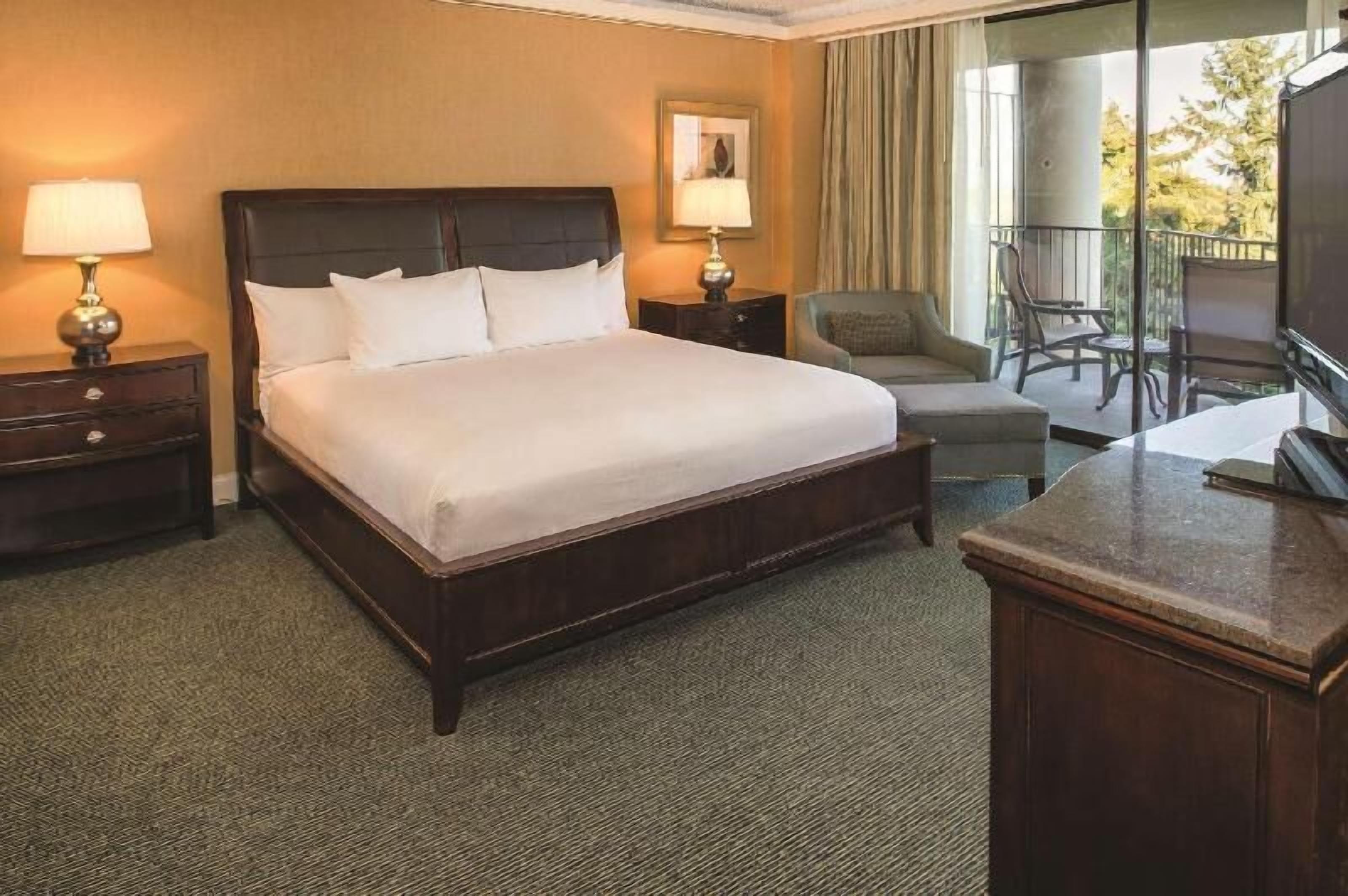 Premium bedding, down comforters, pillowtop beds, in-room safe