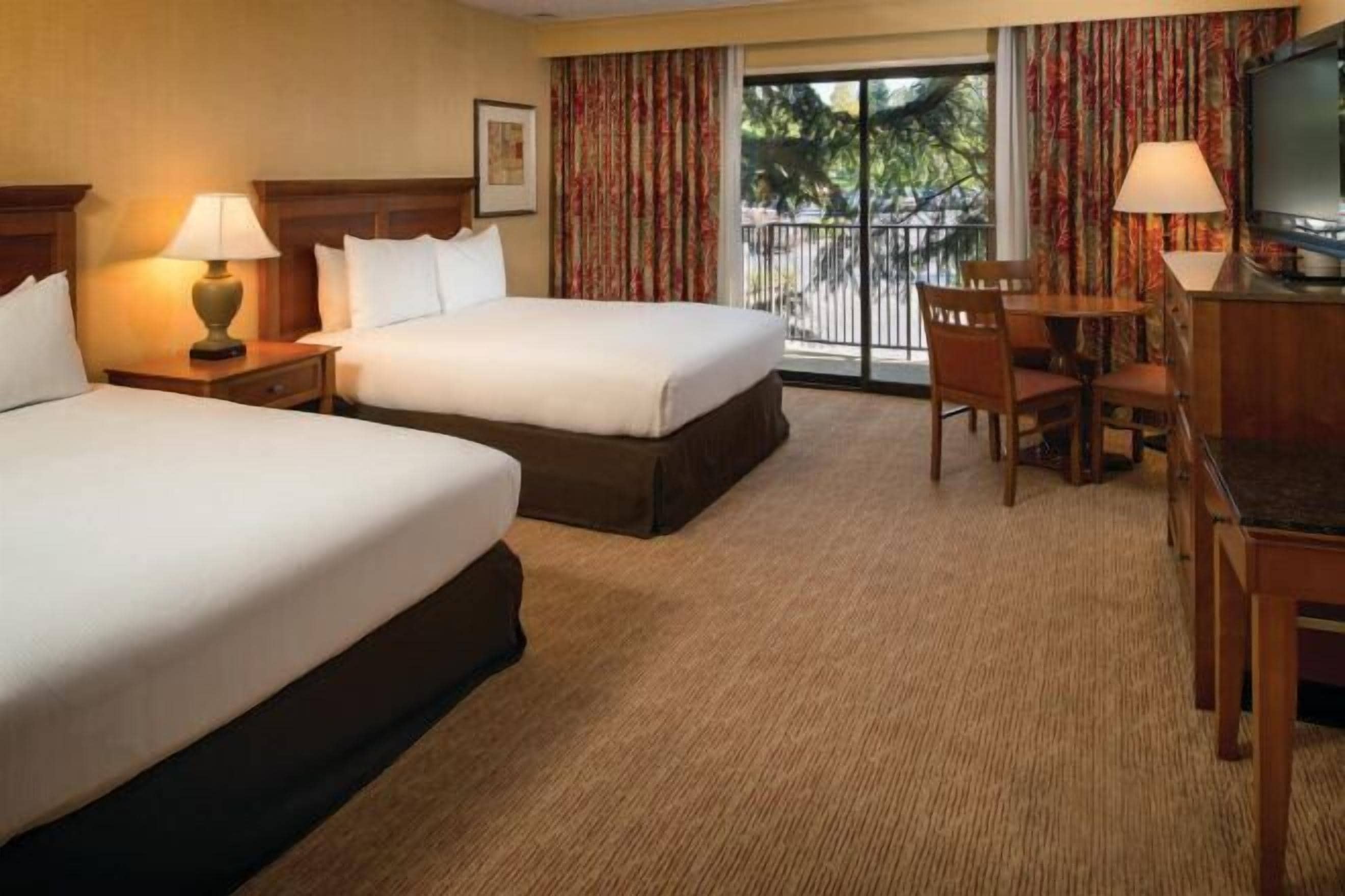 Premium bedding, down comforters, pillowtop beds, in-room safe