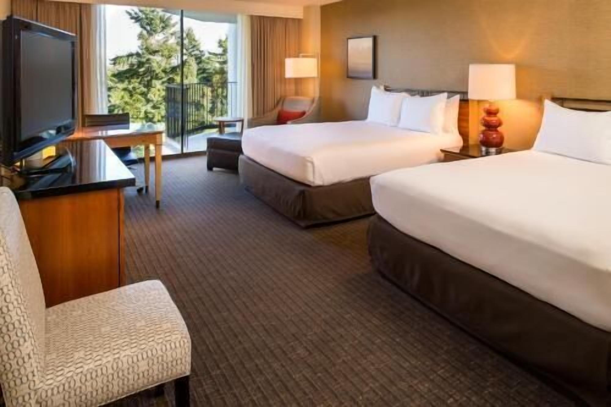 Premium bedding, down comforters, pillowtop beds, in-room safe