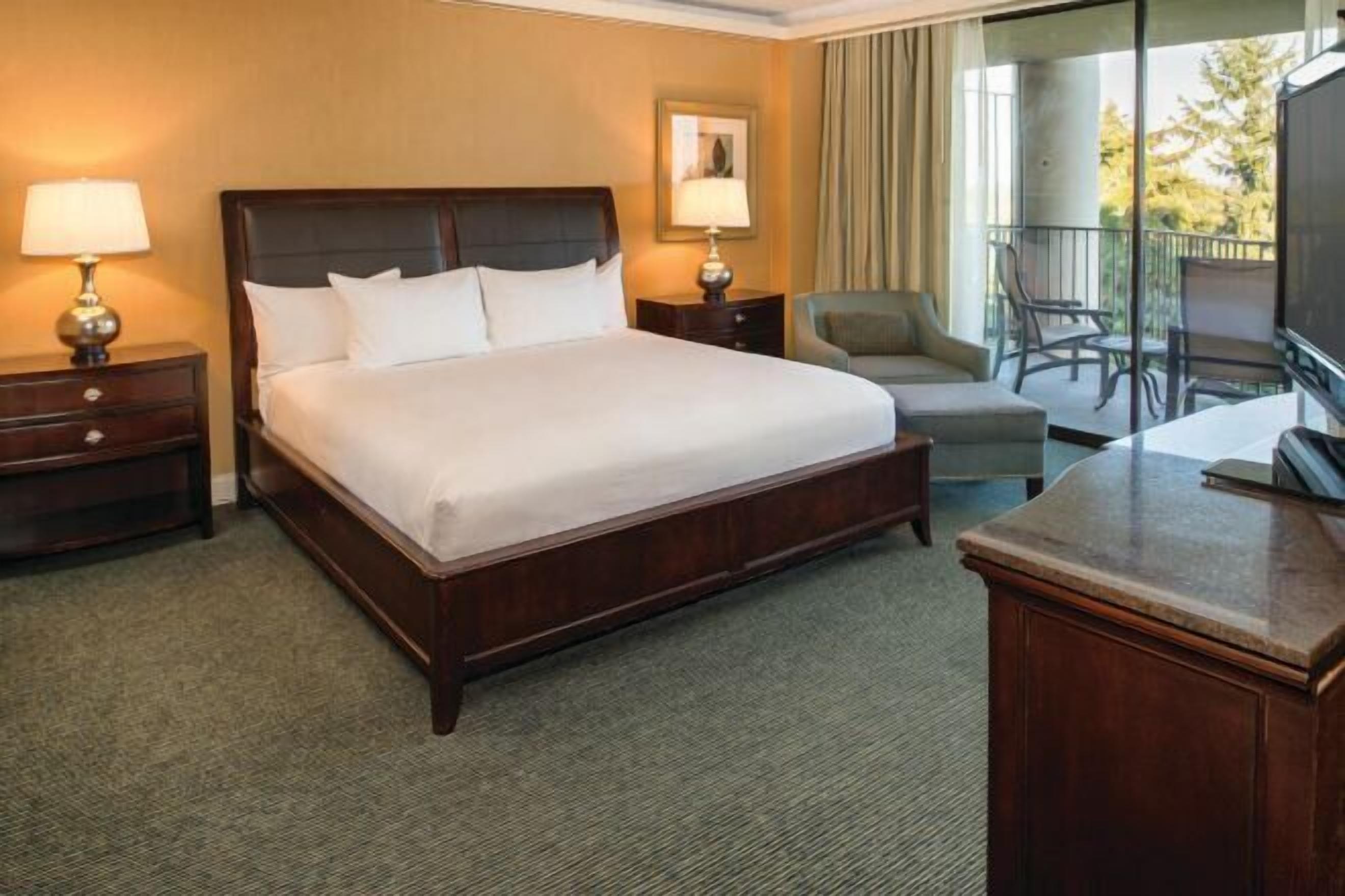 Premium bedding, down comforters, pillowtop beds, in-room safe