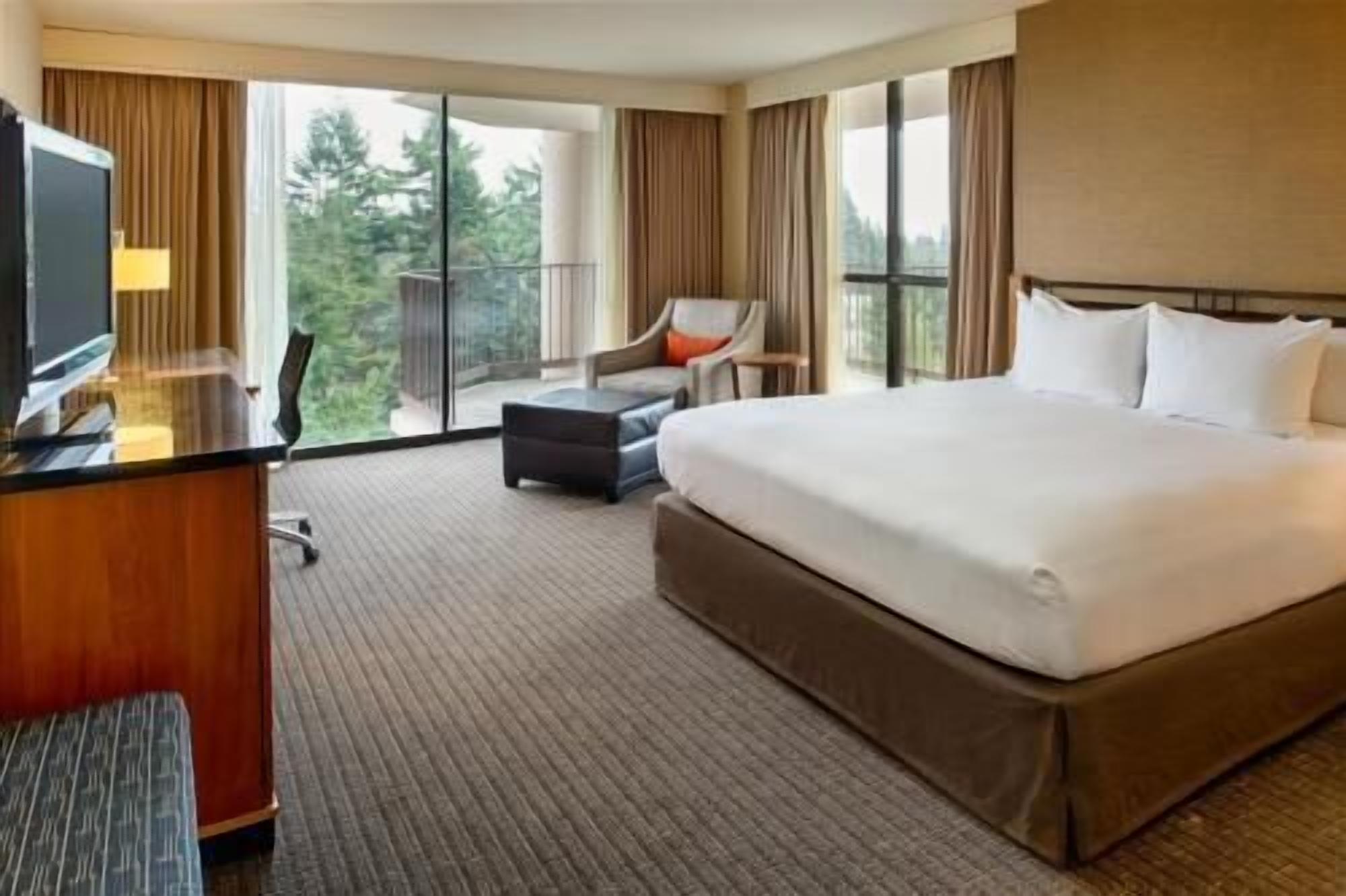 Premium bedding, down comforters, pillowtop beds, in-room safe