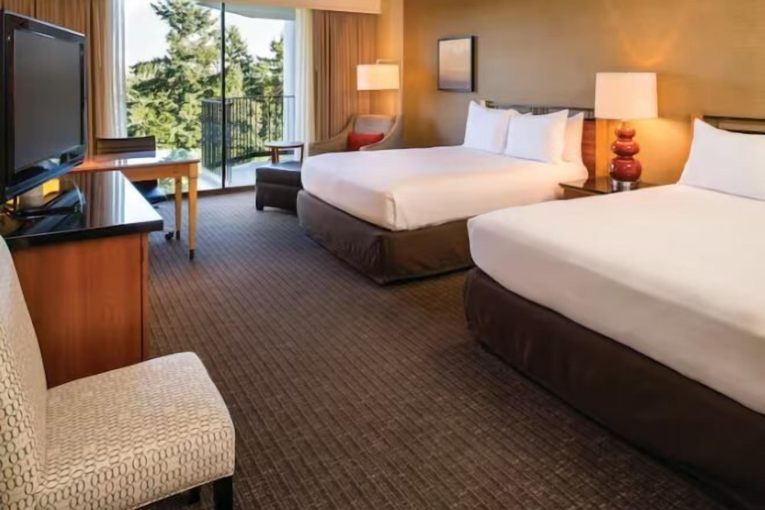 Premium bedding, down comforters, pillowtop beds, in-room safe