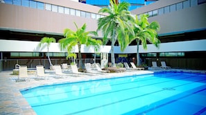 Outdoor pool, open 7:00 AM to 9:00 PM, sun loungers