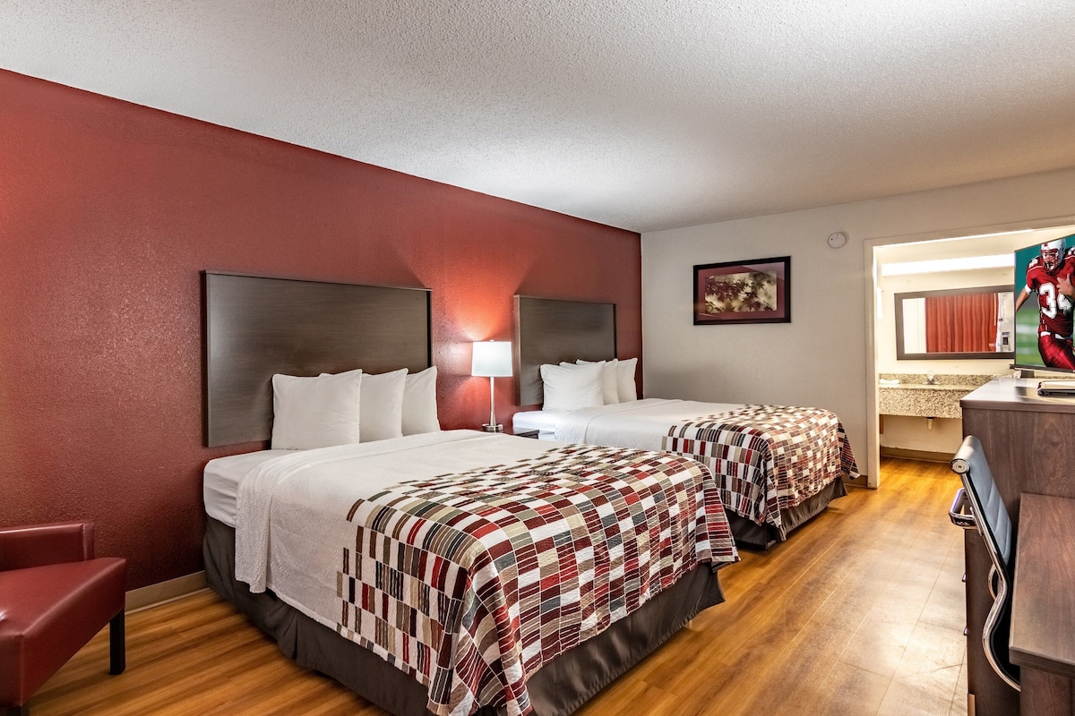 Blackout drapes, cribs (free), WiFi (free), bed sheets