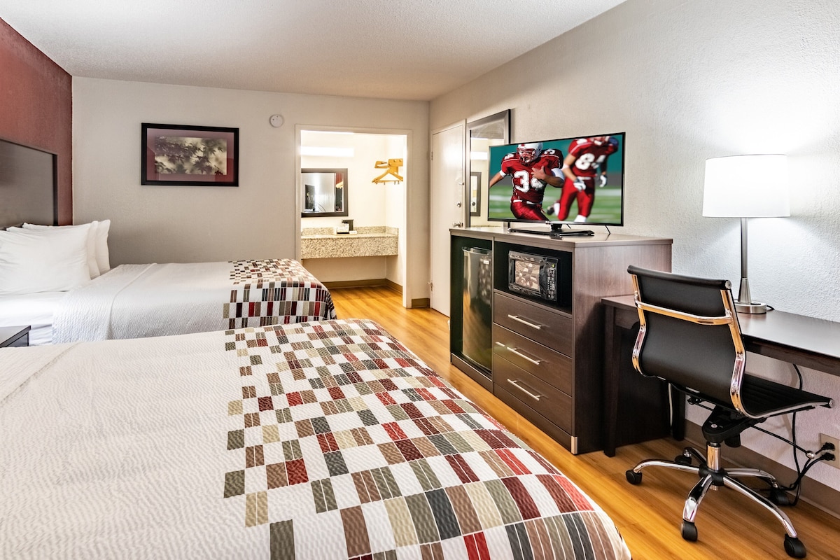Blackout drapes, cribs (free), WiFi (free), bed sheets