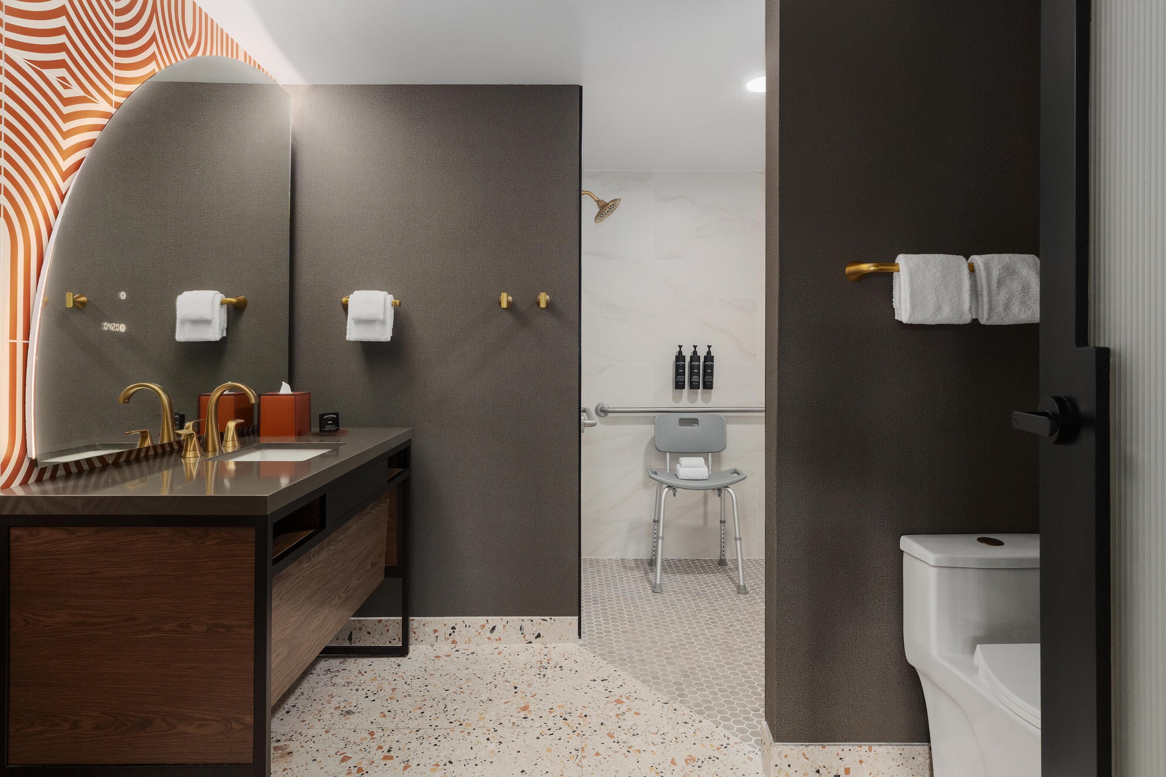 Deluxe Room, 1 King Bed, Mobility Accessible (Roll-In Shower) | Bathroom shower
