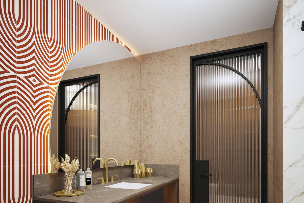 Un baño moderno con un tocador oscuro, un espejo grande y una puerta de vidrio esmerilado.