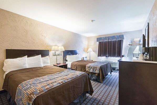 Desk, laptop workspace, blackout drapes, iron/ironing board - Rodeway Inn (Austin)