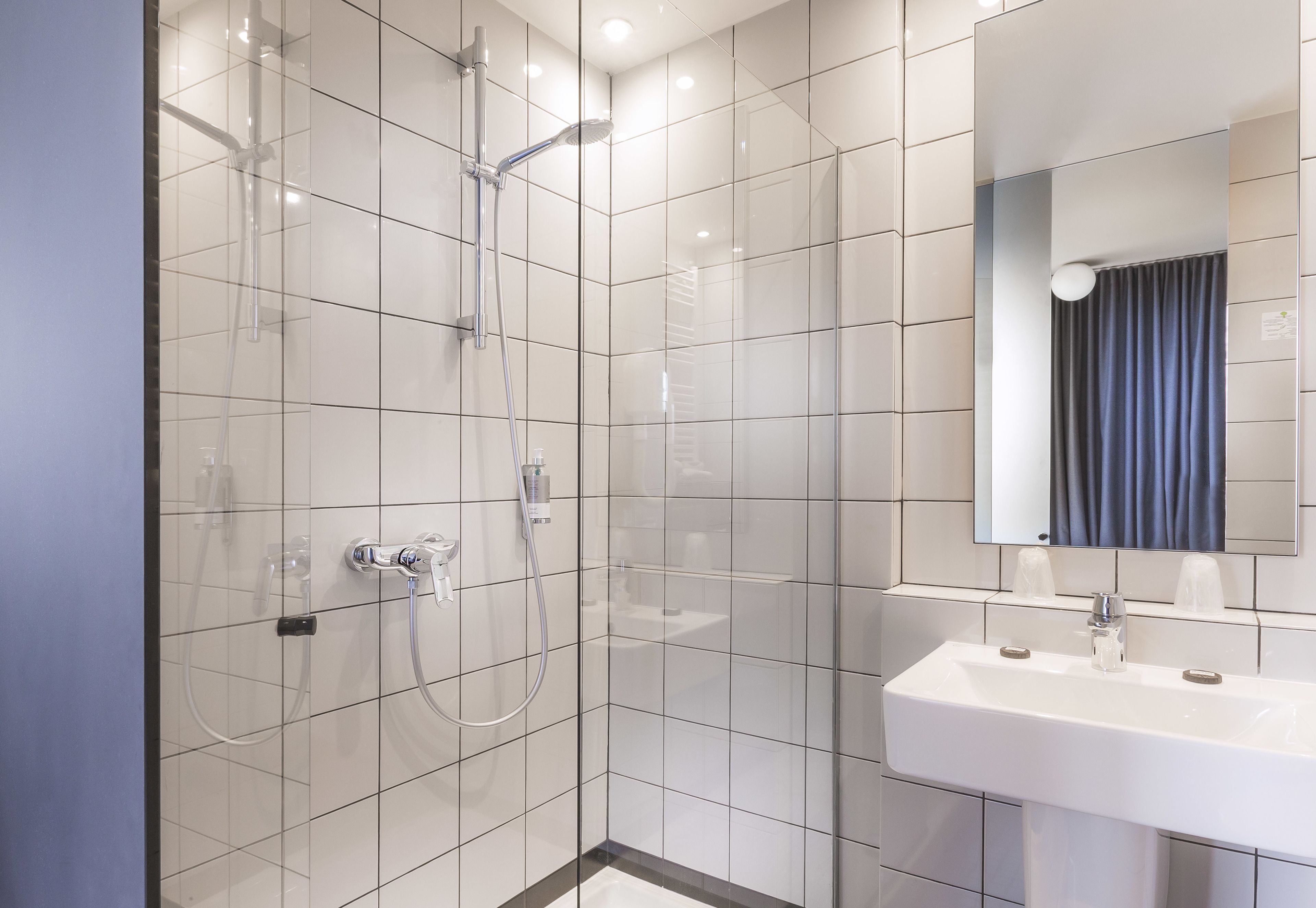 comfort room, courtyard view | bathroom | free toiletries, hair dryer, towels, soap