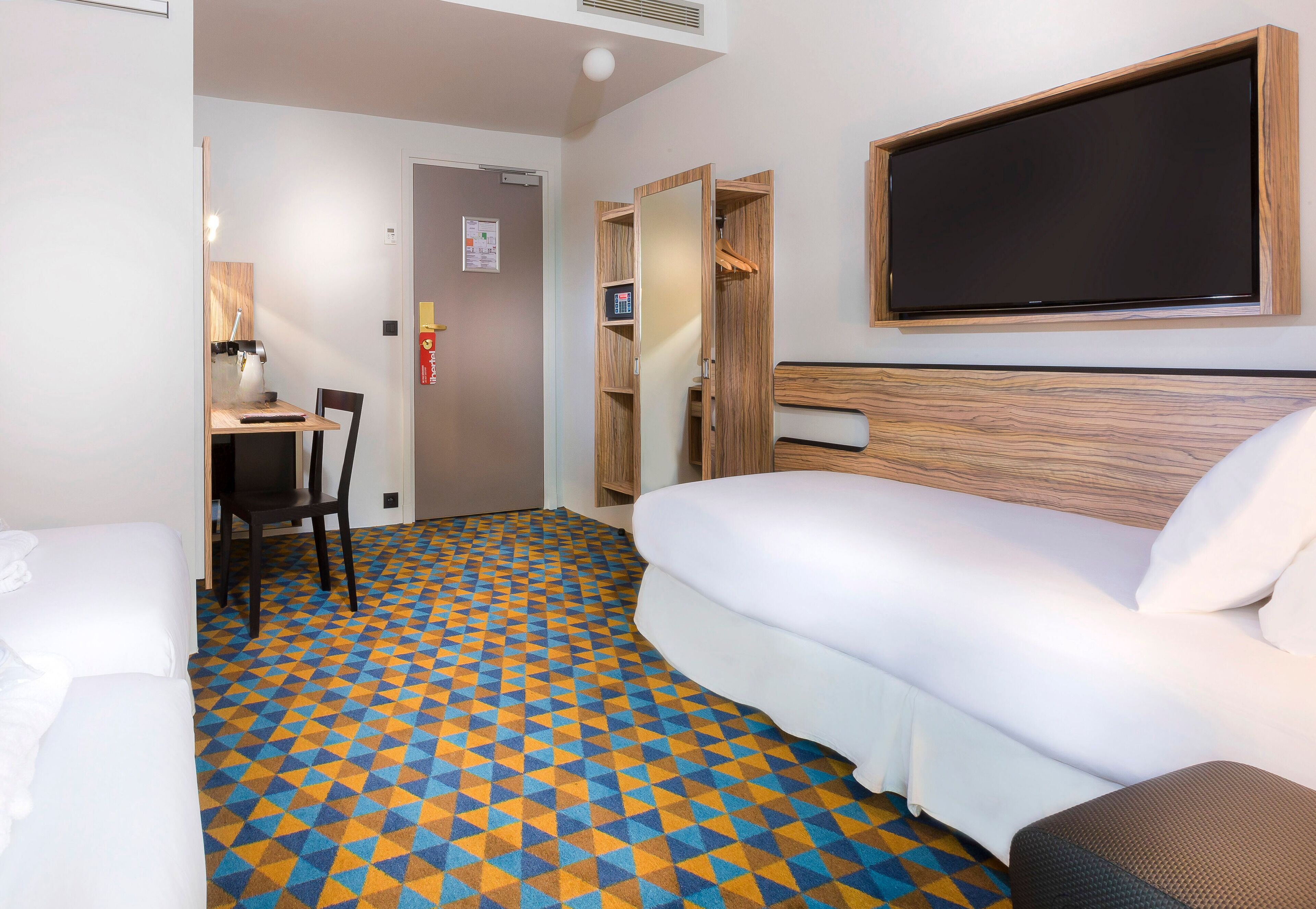 family room | premium bedding, desk, soundproofing, iron/ironing board