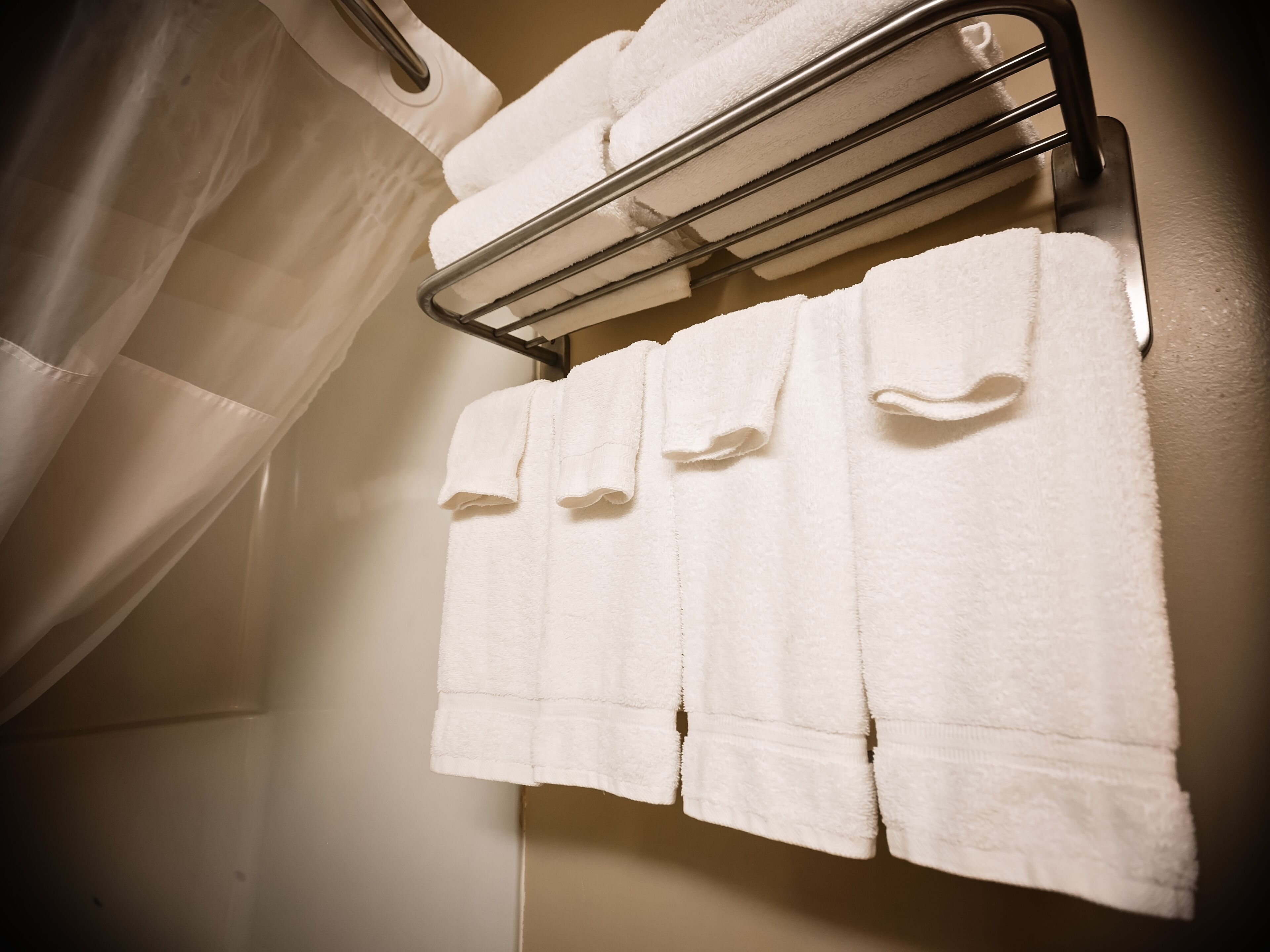 combined shower/bathtub, eco-friendly toiletries, hair dryer, towels