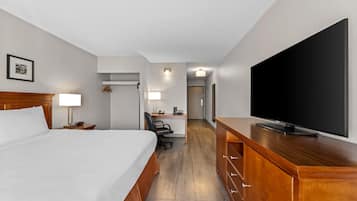 Chambre Deluxe, 1 très grand lit, non-fumeurs | Bureau, espace de travail pour ordinateur portable, rideaux occultants