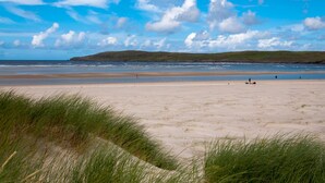 A beach with sand dunes and a clear sky. - The Abbey Hotel Donegal (Donegal)