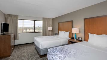 Deluxe Suite, 2 Queen Beds, Non Smoking, City View | Desk, blackout curtains, iron/ironing board, free cots/infant beds