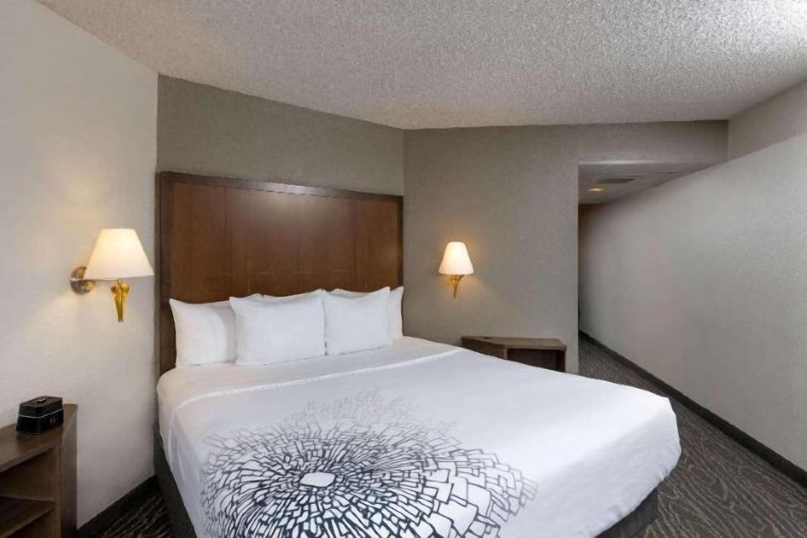 Desk, blackout drapes, iron/ironing board, free cribs/infant beds