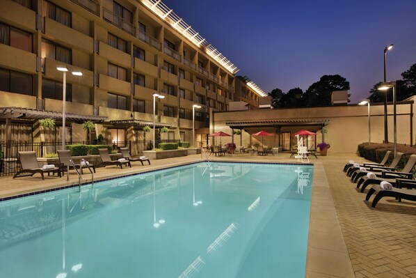 Seasonal outdoor pool, open 6:00 AM to 10:00 PM, pool umbrellas