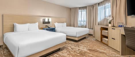 Premium bedding, desk, blackout drapes, soundproofing