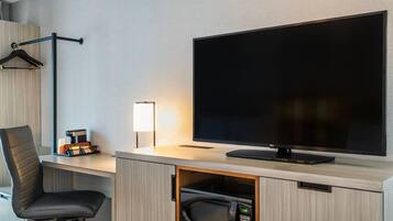 Premium bedding, desk, blackout drapes, soundproofing