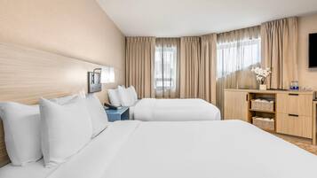 Premium bedding, desk, blackout curtains, soundproofing