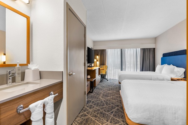 Room, 2 Double Beds, Non Smoking | Bathroom | Combined shower/tub, free toiletries, hair dryer, towels