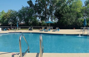 Seasonal outdoor pool, pool loungers