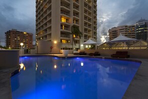 Outdoor pool, a heated pool, sun loungers