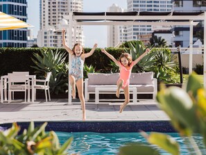 Outdoor pool, a heated pool, sun loungers