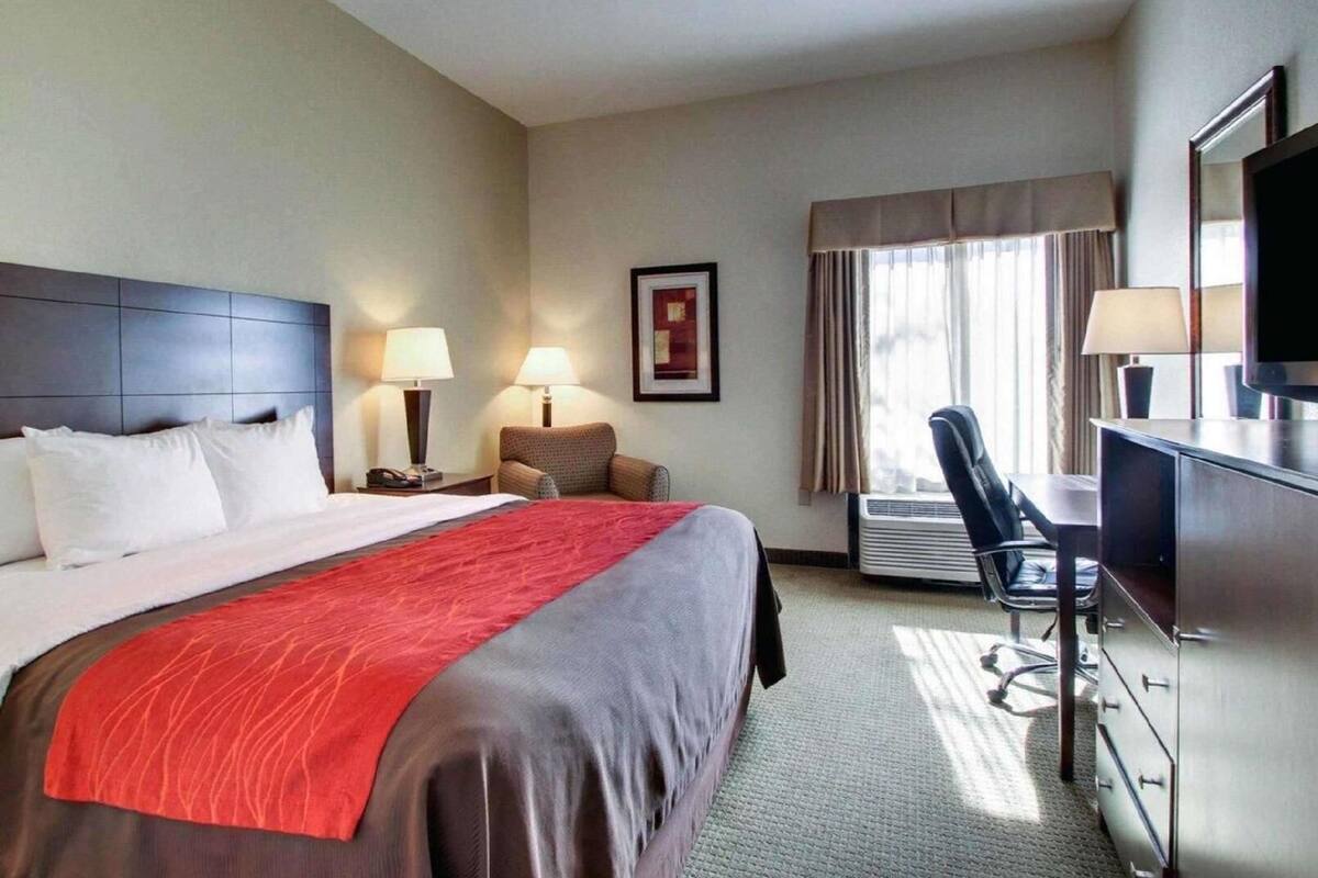 Blackout drapes, soundproofing, iron/ironing board