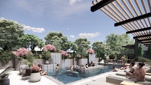 A pool area with lounge chairs and a pergola. - The Greenleigh, River Oaks, Autograph Collection (Houston)