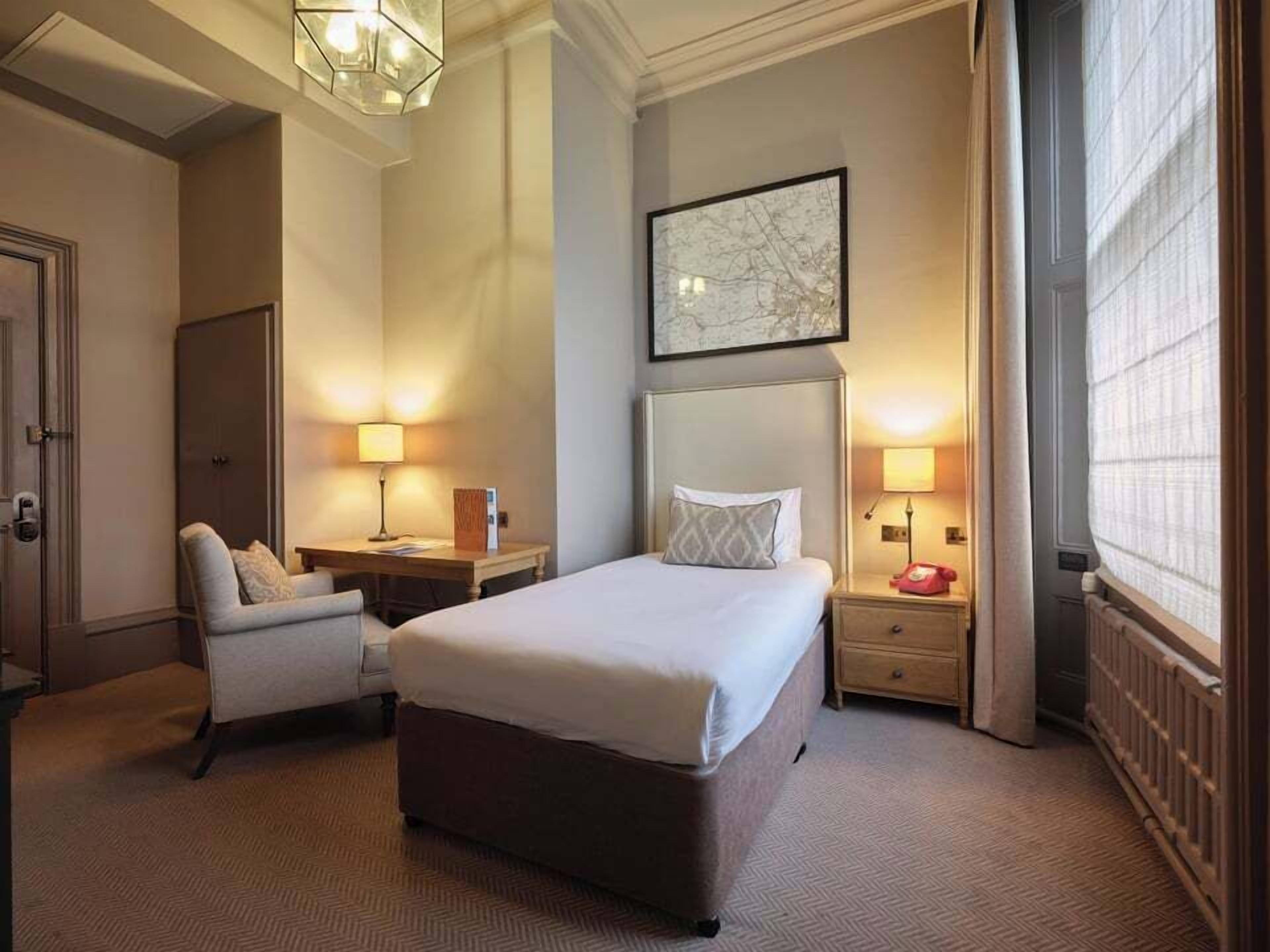 Habitación individual | Caja fuerte, escritorio, tabla de planchar con plancha y wifi gratis