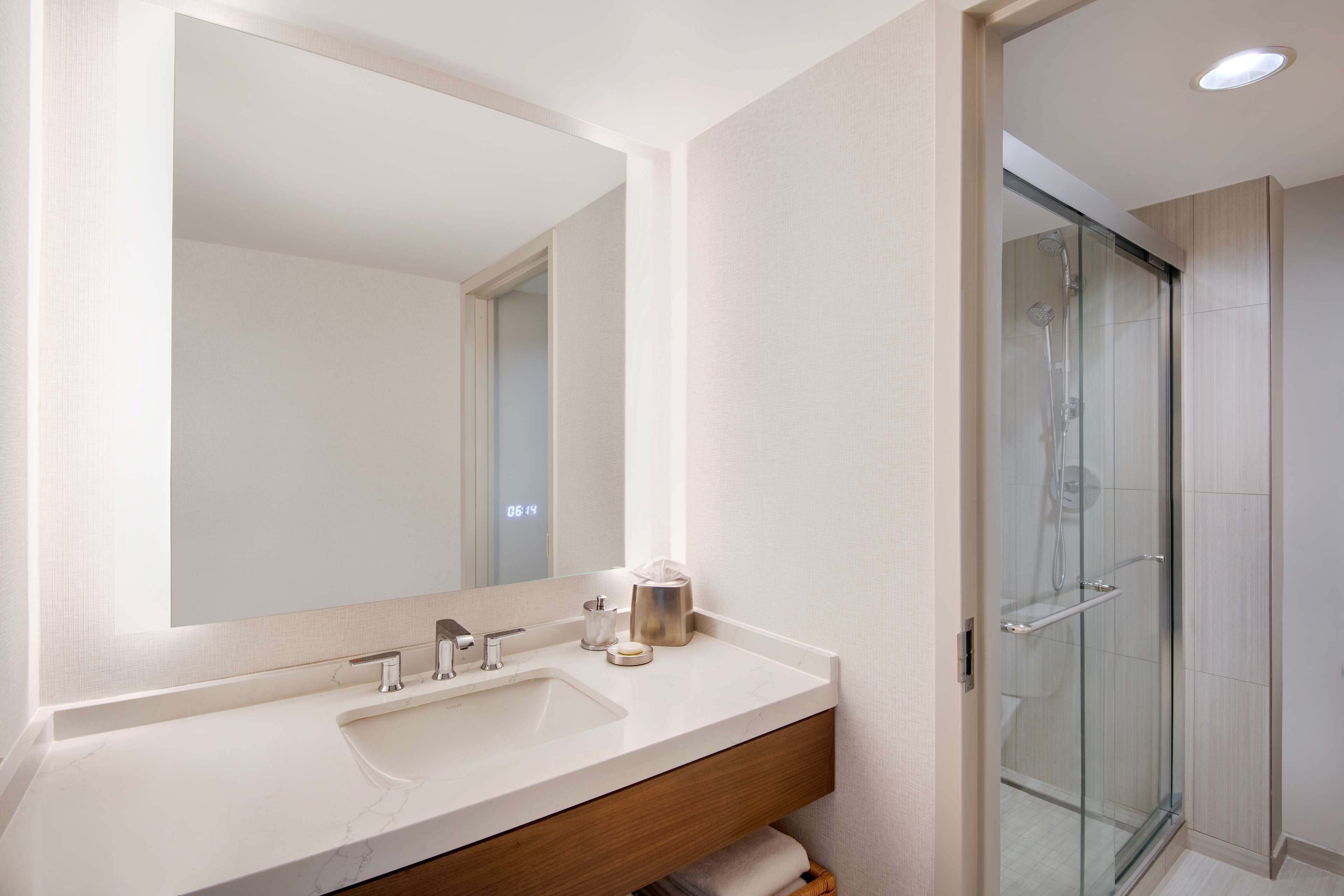 combined shower/bathtub, spring water bathtub, designer toiletries