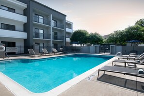 Outdoor pool, open 6:00 AM to 11:00 PM, pool umbrellas, pool loungers