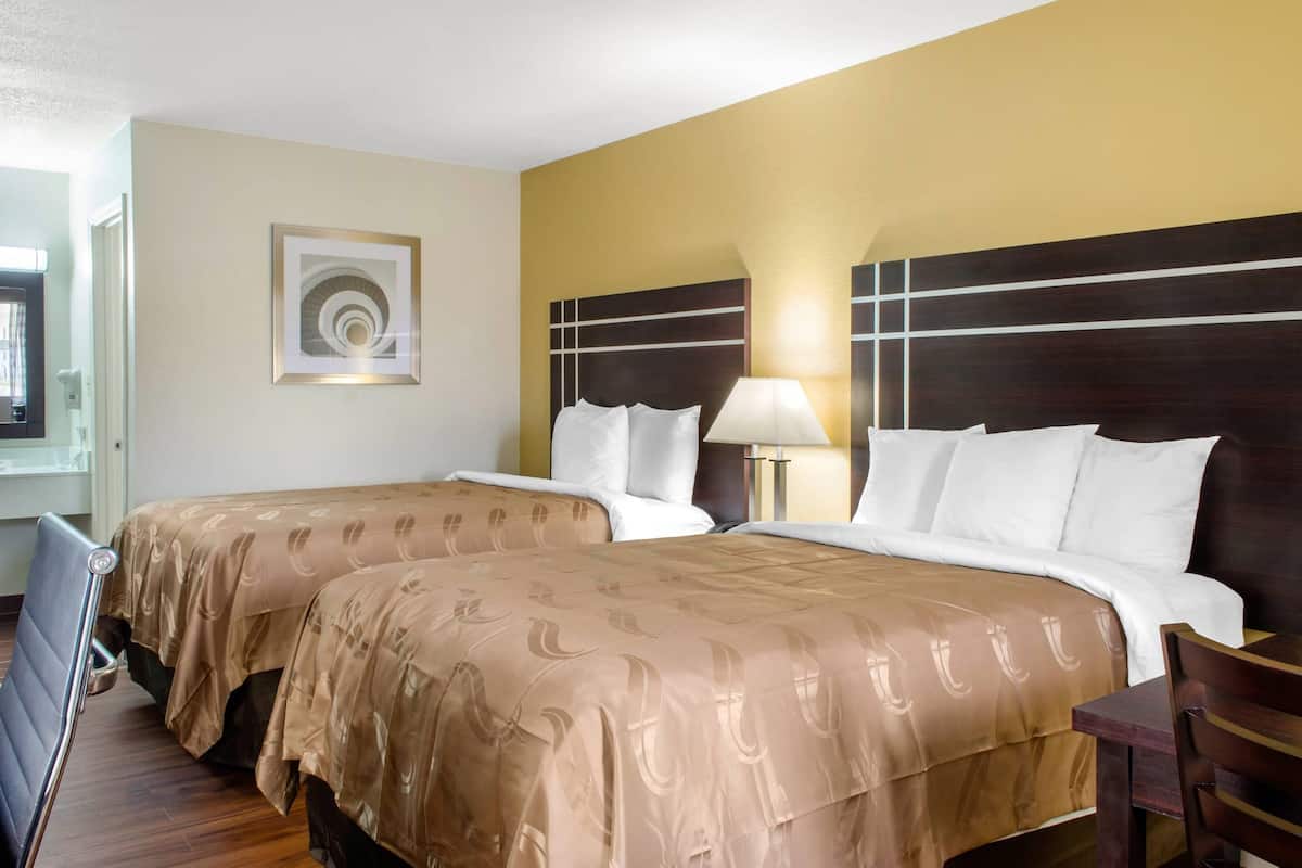 Premium bedding, desk, blackout curtains, iron/ironing board