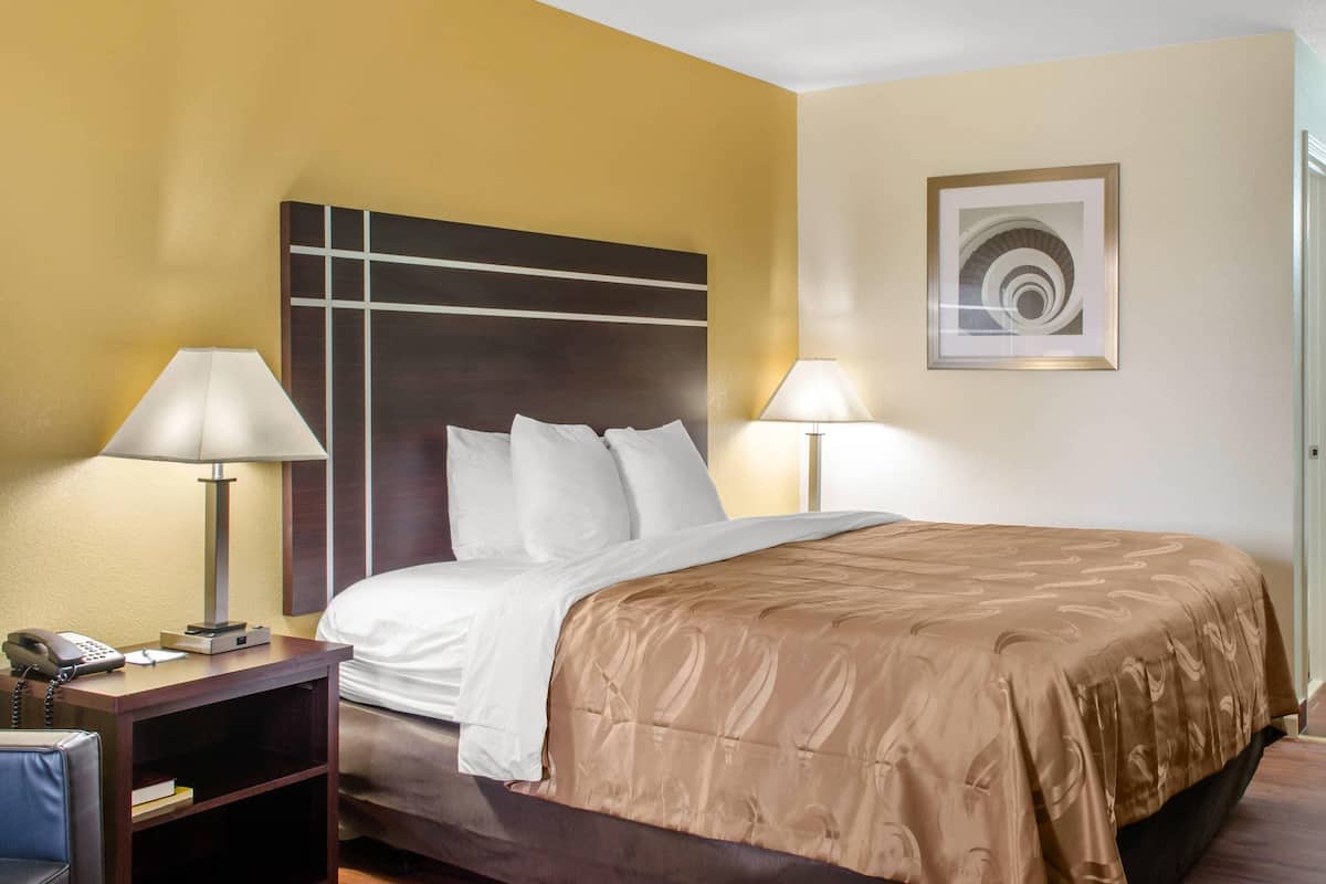 Premium bedding, desk, blackout curtains, iron/ironing board