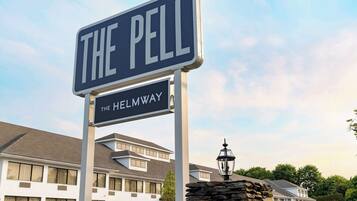 Welcome to The Pell, located on The Helmway, with a modern building featuring a two-story design and multiple windows.