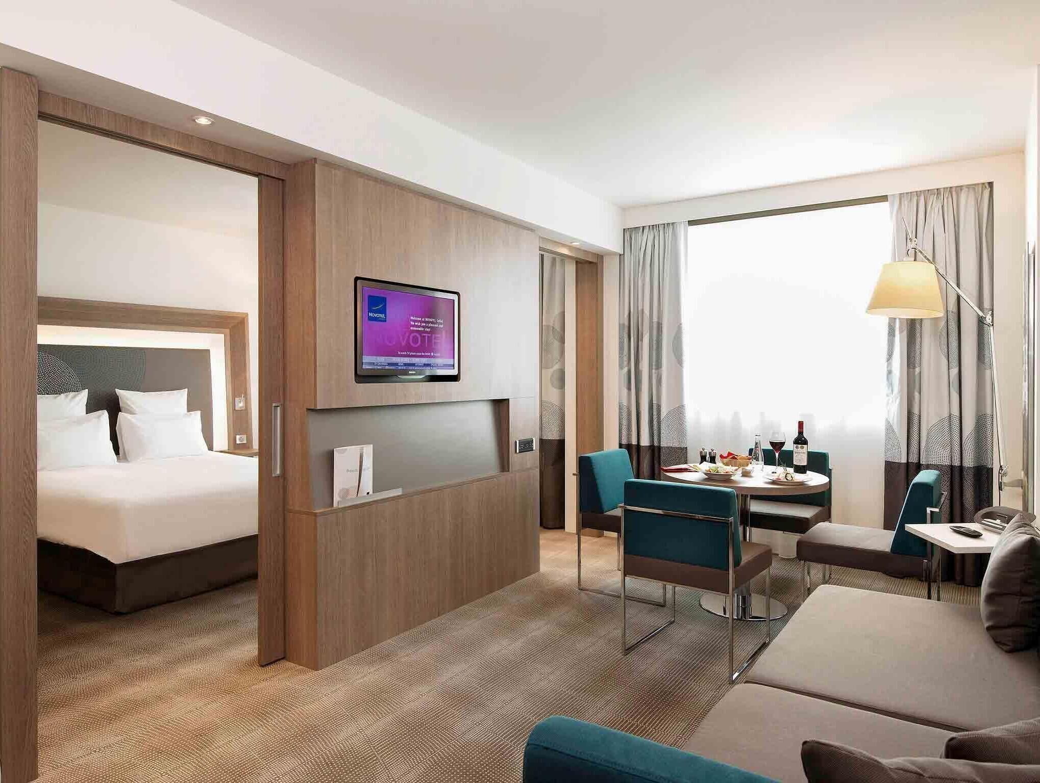 Suite, 1 Queen Bed with Sofa bed | 1 bedroom, minibar, in-room safe, desk