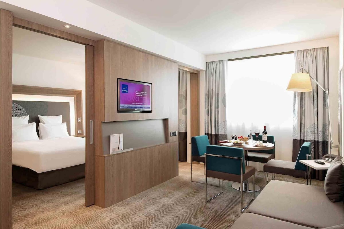 Suite, 1 Queen Bed with Sofa bed | 1 bedroom, minibar, in-room safe, desk