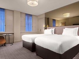 Superior Twin | Premium bedding, blackout drapes, free WiFi, bed sheets