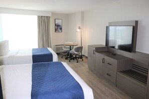 In-room safe, desk, laptop workspace, blackout curtains - Best Western Aku Tiki Inn (Daytona Beach Shores)