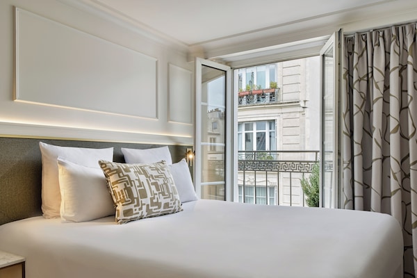 Classic Double Room, Balcony, Moulin Rouge view | In-room safe, desk, blackout drapes, iron/ironing board