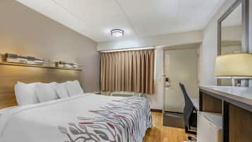 Desk, blackout drapes, iron/ironing board, cribs (free)