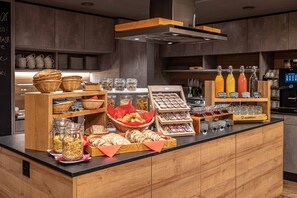 Daily buffet breakfast (CHF 22 per person)