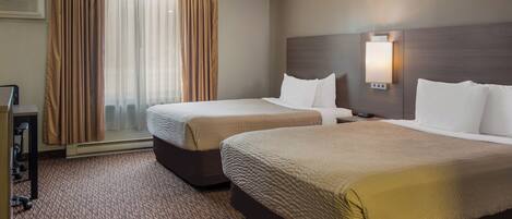 Habitación estándar, 2 camas Queen size, para no fumadores | 1 habitación y ropa de cama de alta calidad