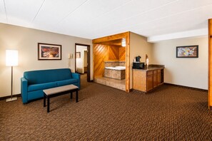 Suite, 1 King Bed, Non Smoking | Living area | 32-inch LCD TV with cable channels, TV - Econo Lodge Duluth near Miller Hill Mall (Duluth)